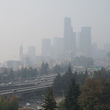 a view of downtown seattle and I5 obscured by heavy smoke in the air