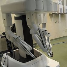 photo of large robotic device in clinical setting