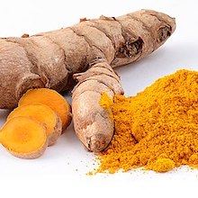 photo of a turmeric root, slices of the root, and powdered turmeric spice