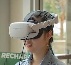 woman wearing VR goggles