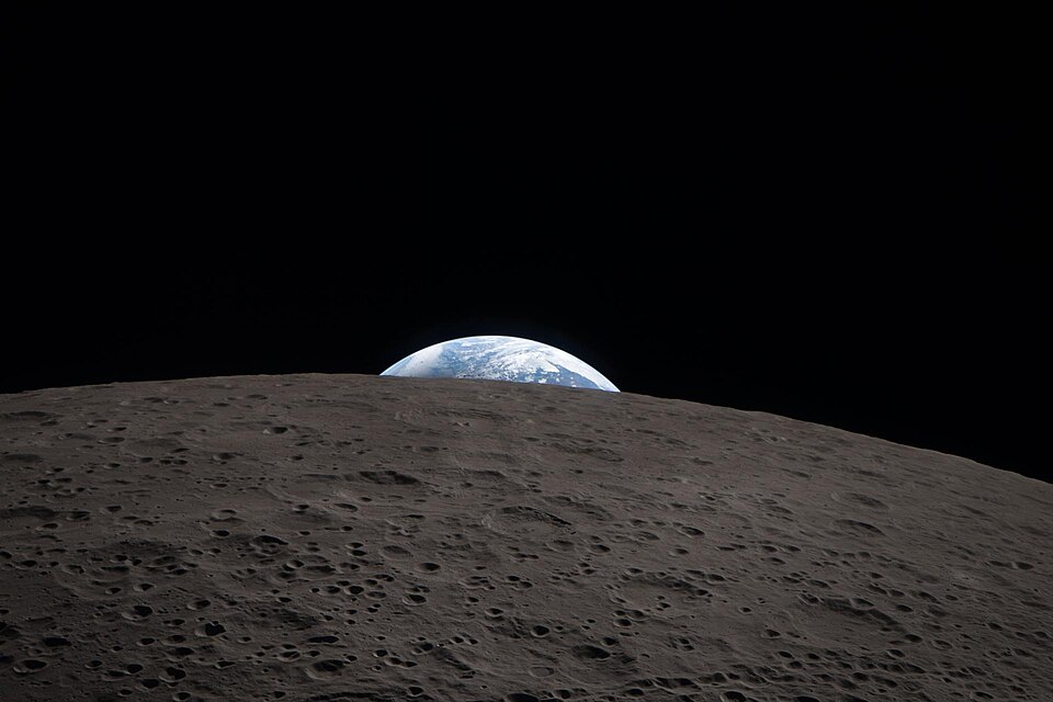 An earthset as seem from Artemis II during lunar fly-by